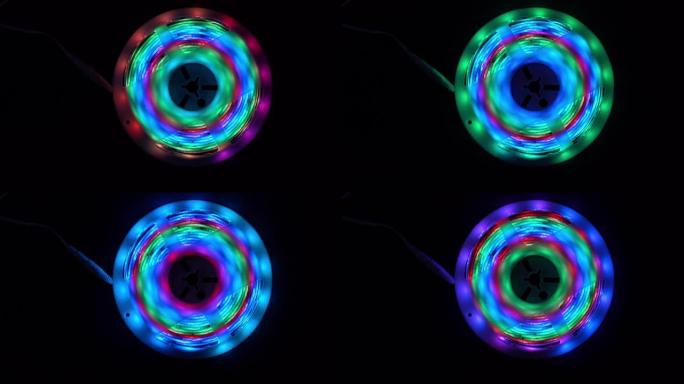 美丽的彩色发光二极管闪电圈在黑色背景下，具有闪电效果。