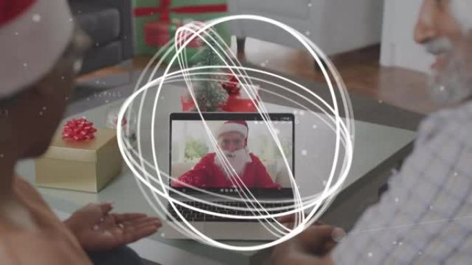 在与圣诞老人的笔记本电脑视频通话中，在高级夫妇身上旋转的轮子的动画