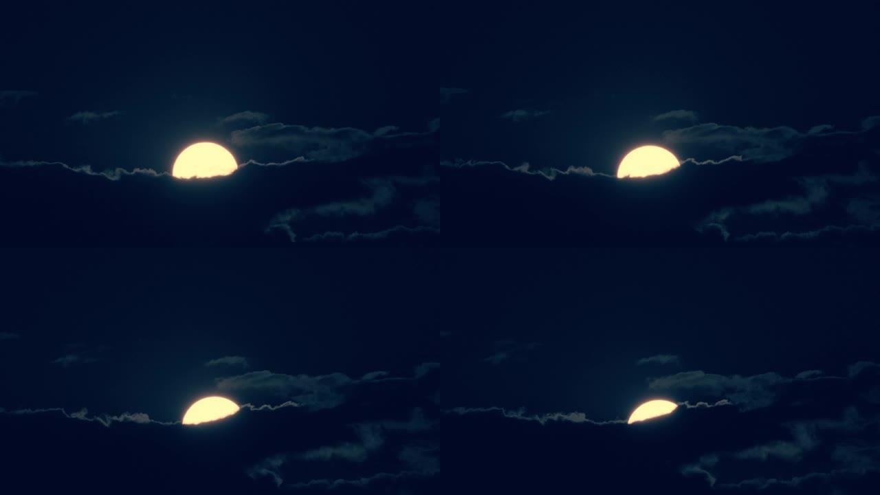 云层后面的巨大月亮