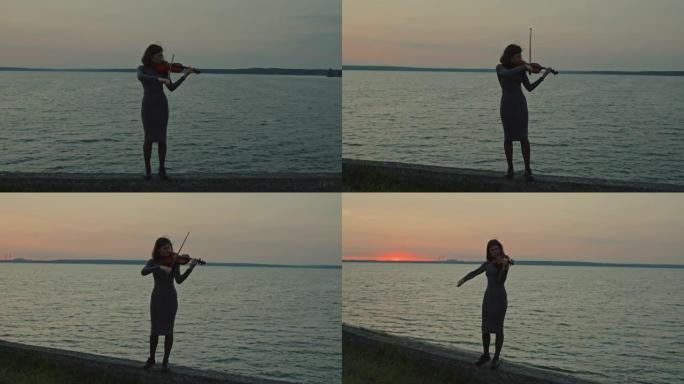 女人在湖边拉小提琴
