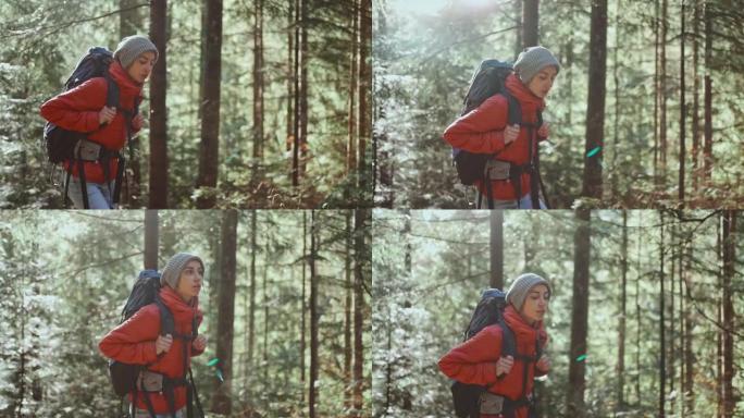 冒险灵感的女人，背包走在小路森林上。秋季假期和假期旅行，女远足学生进行数字排毒，徒步旅行假期，亲近自