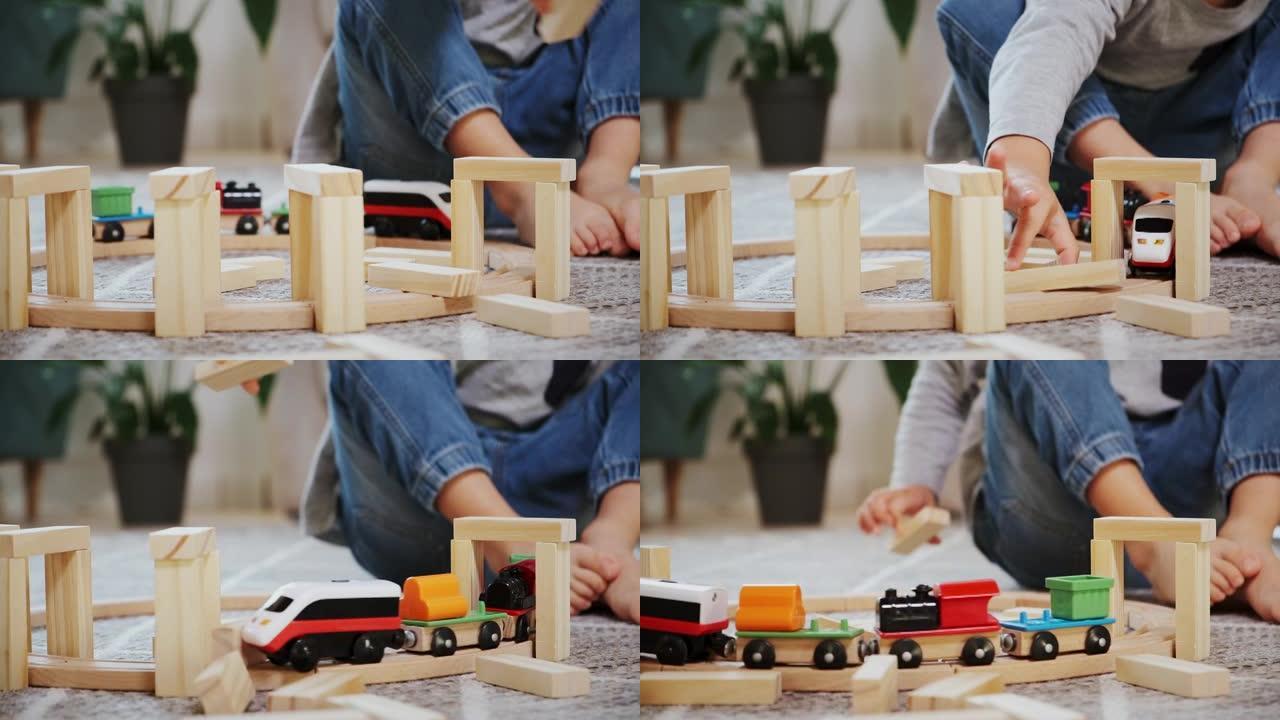 儿童建造木制铁路，掉落的物品，玩具火车出轨