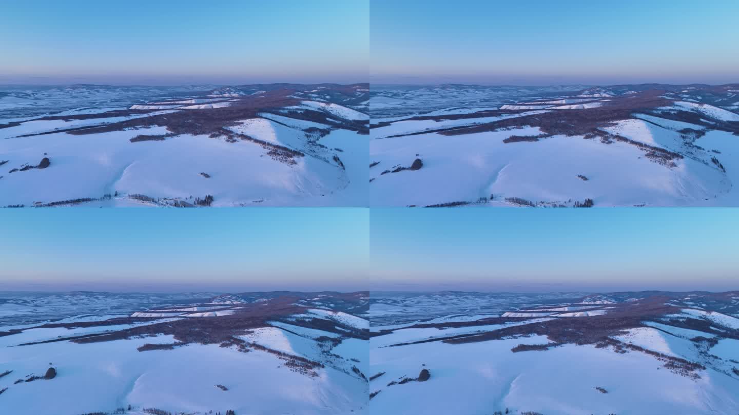 航拍内蒙古雪域雪原山峦暮色