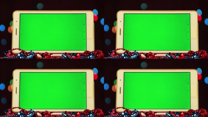圣诞节视频屏幕保护程序-带有绿色屏幕的平板电脑。