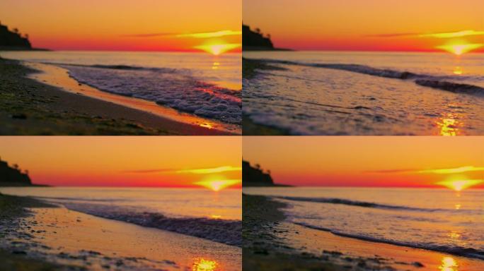 太阳升起在金色日出早晨在水面反射的海面上