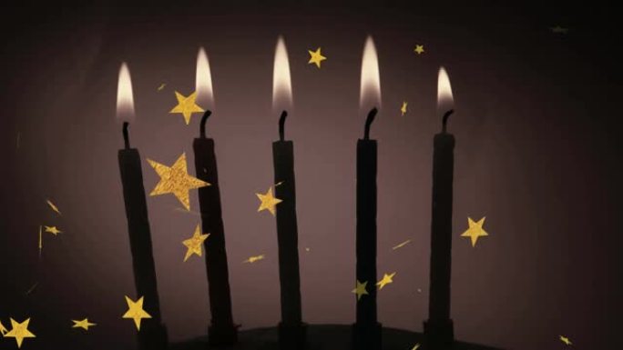 黑色背景上的蜡烛和星星的动画