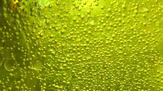 碳酸绿色气泡特写背景