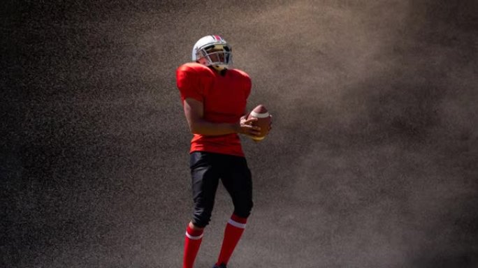 黑色背景上的美式足球运动员在烟雾中持球动画