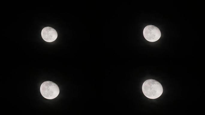夜晚有黑色天空背景的满月特写镜头，4k镜头放大效果。