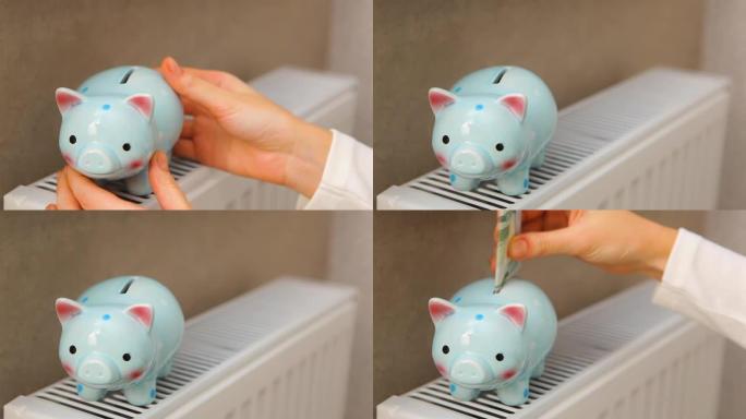 室内散热器上的猪存钱罐特写。加热概念。