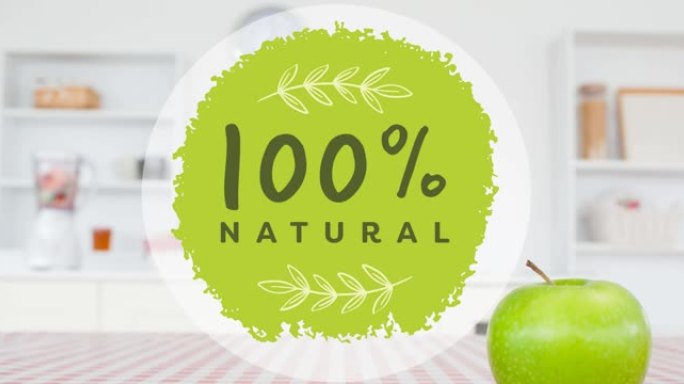 100% 自然文本的动画在绿色，在厨房的桌子上的苹果