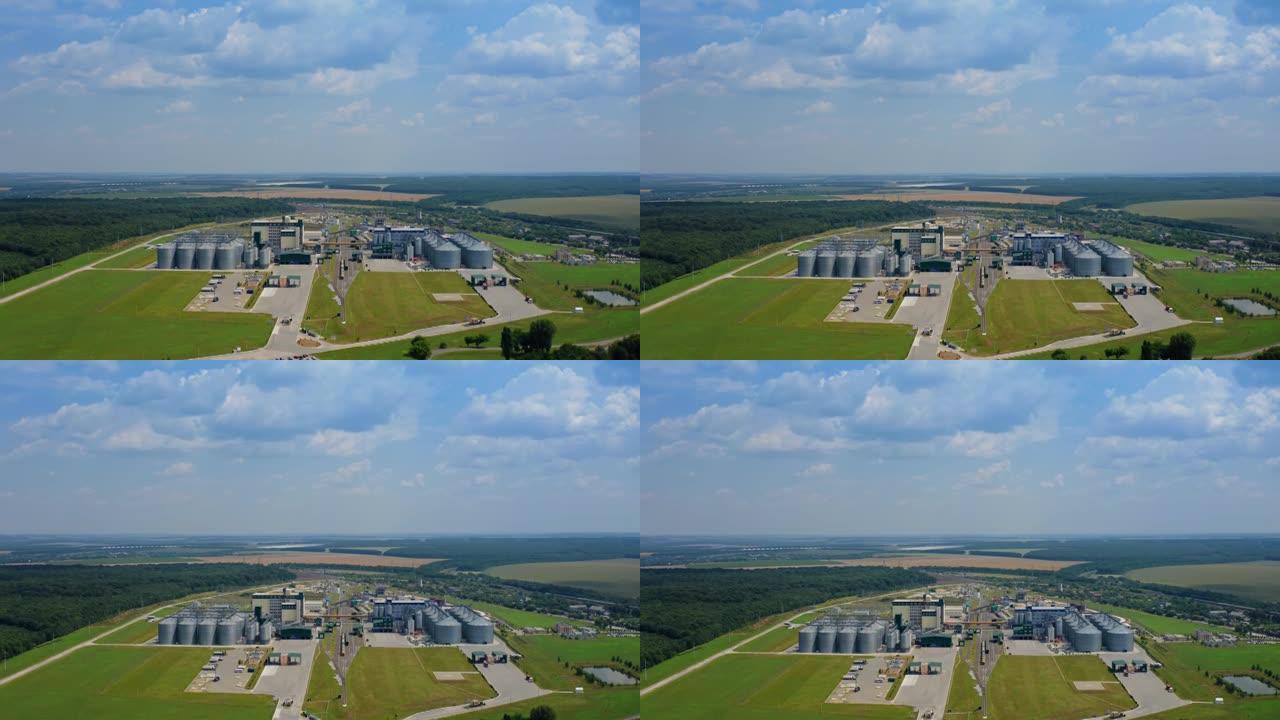 工业谷物升降机仓库的无人机视图。大型工厂金属仓库。