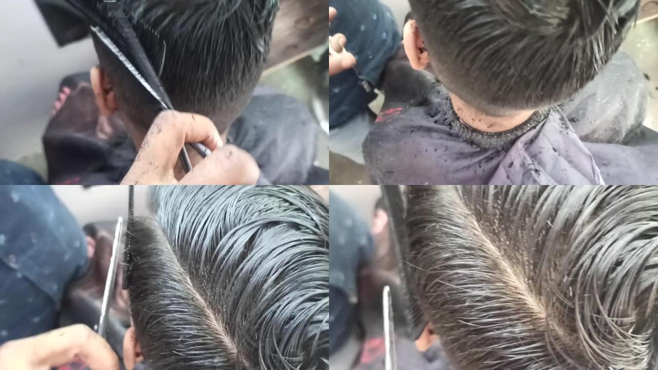 理发理发师正在剪一个小男孩的完美头发。