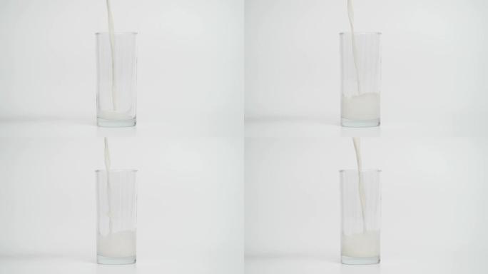 将牛奶倒入玻璃中的超慢动作，1000 fps