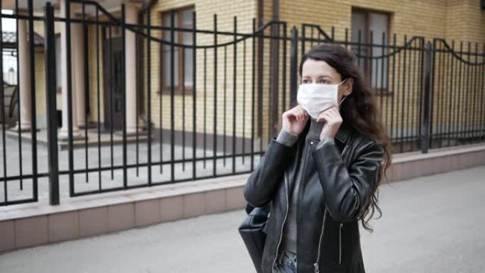 由于流感病毒，年轻女子白天在市中心戴上口罩，并试图保护自己免受传染病的侵害