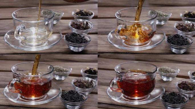 茶从茶壶慢慢倒入玻璃杯中，周围有盛有不同类型叶茶的碗，老式木桌。