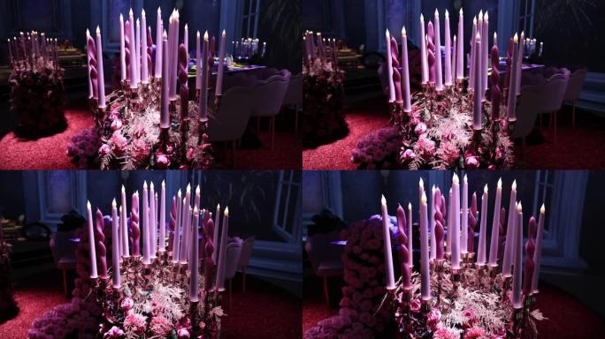 电池供电的电子蜡烛，烛台上的粉色蜡烛，婚礼装饰的粉色蜡烛灯