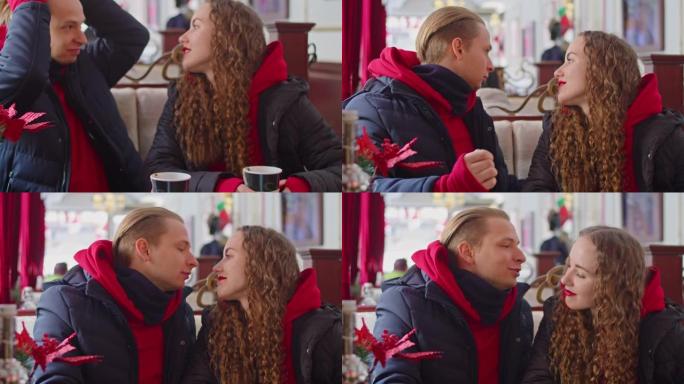 冬天，一个男孩和一个女孩在咖啡馆喝茶