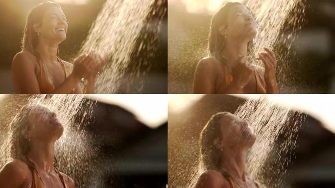 在大自然中洗澡的幸福女人。