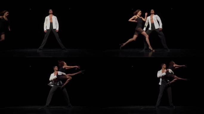 交际舞情侣在黑暗的舞台上，舞蹈表演部分。身穿黑色透明短裙的女子跑到身穿白色衬衫未扣的男子面前，跳了起