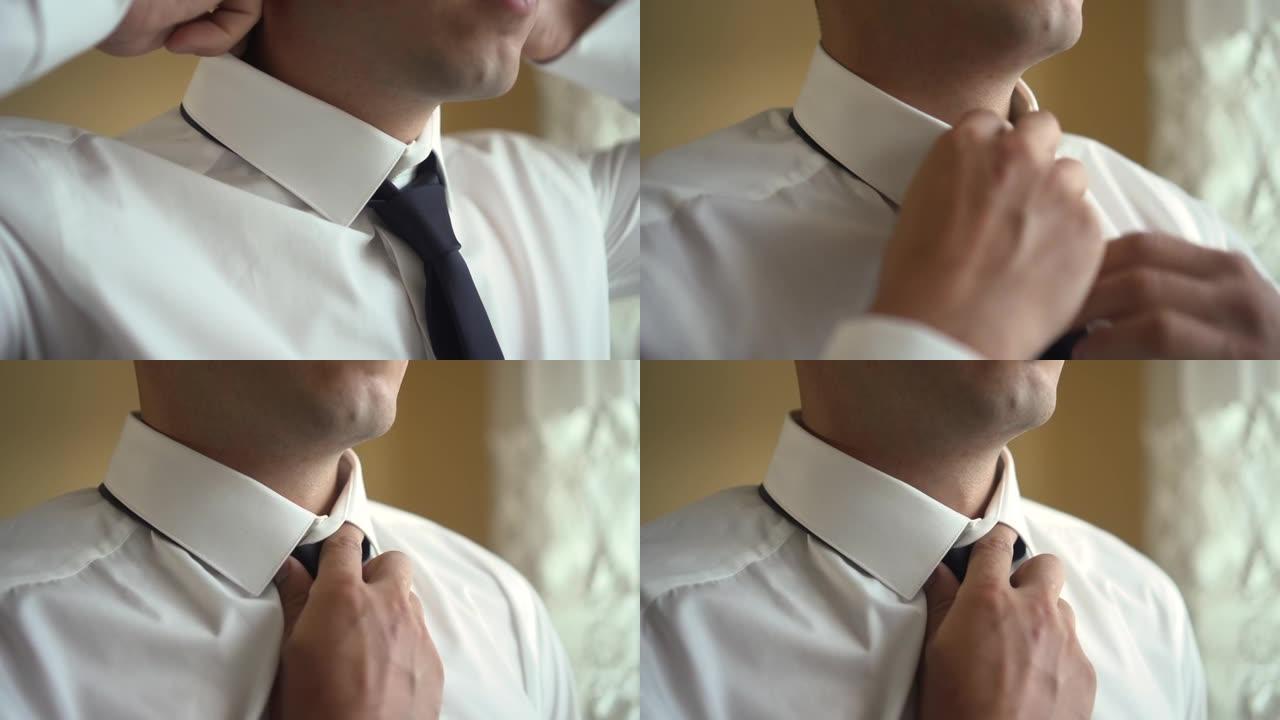 一个男人打领带