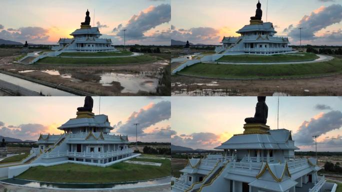 泰国宋卡府Phutthamonthon区Bhudda雕像的空中无人机日落风景