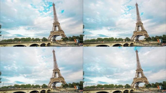 巴黎埃菲尔铁塔在阳光明媚的日子里的时间流逝，背景中云被风吹动