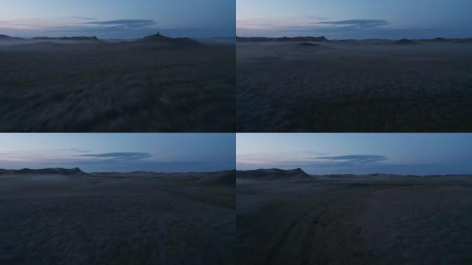 鸟瞰图迷雾的冰岛高地在晚上。月景全景。冰岛月景谷的戏剧性雾蒙蒙的无人机。迷人乡村的雾蒙蒙的鸟眼