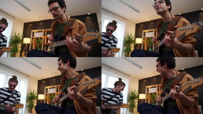音乐家男乐队在家庭工作室演奏电吉他