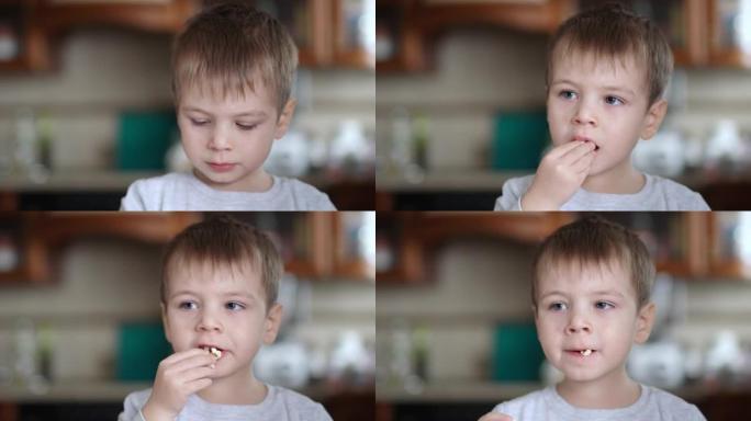 一个生病的孩子在酸奶油中舔手指