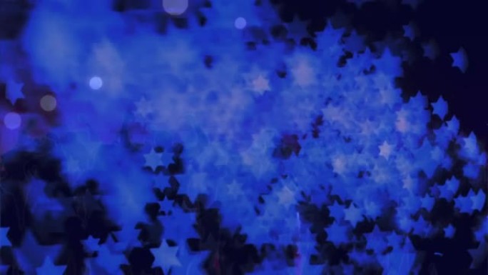 黑色背景上移动的蓝色星星和光投影的动画