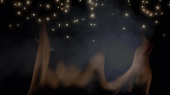 黑色背景上的圣诞节星星掉落在烟雾中的动画