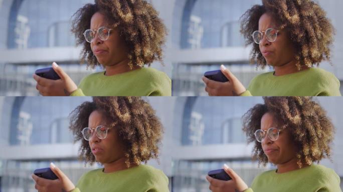 不满的黑人妇女的情绪在小工具上阅读坏消息，问题