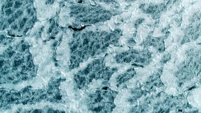 抽象冰面冰冻蓝海的航拍。无人机自上而下。全高清