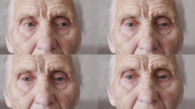 一个有着深深的皱纹的老妇人的肖像。