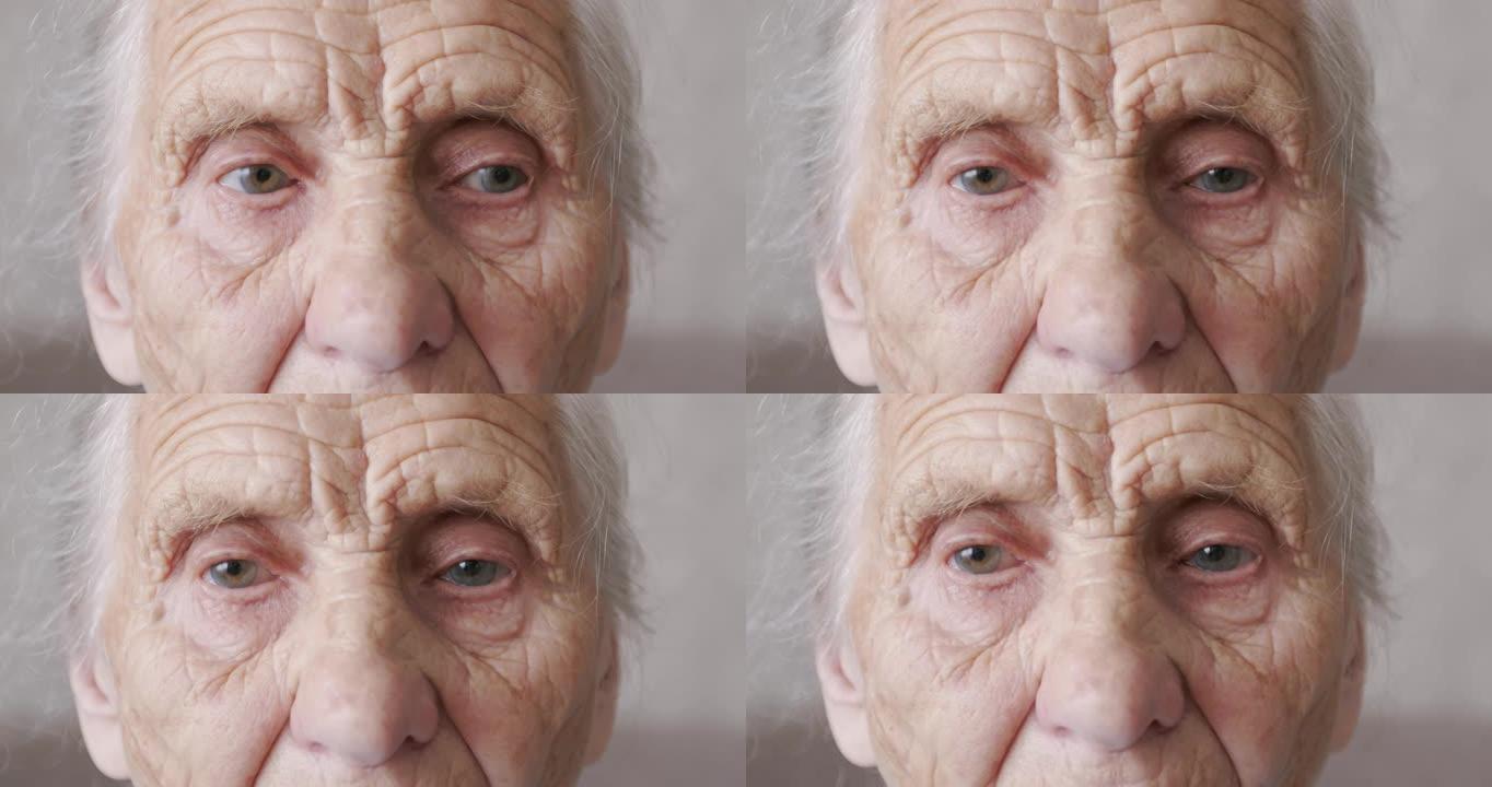 一个有着深深的皱纹的老妇人的肖像。