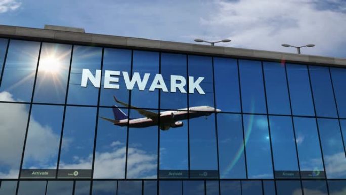飞机降落在美国新泽西州纽瓦克机场，在航站楼中镜像