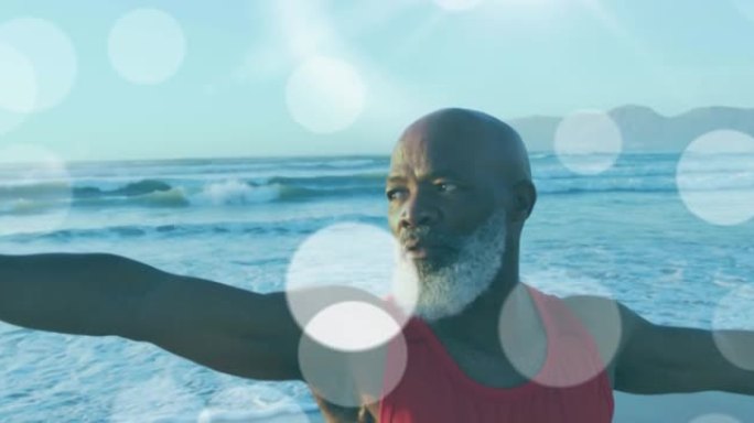 高级黑人男子在海滩上在光点上练习瑜伽的动画