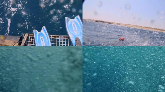4k视频片段，一名潜水员从埃及红海的一艘潜水船的后部进入水面
