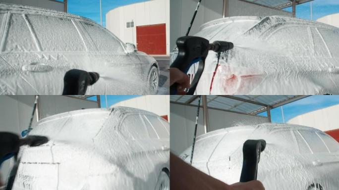 POV摄像机第一人称视角使用带泡沫的高压覆盖物洗车