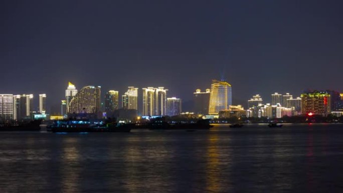 夜间照明三亚湾酒店前屋顶全景4k延时中国海南岛