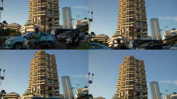 日落时间雅加达市市中心著名现代建筑建筑交通街慢动作全景4k印度尼西亚