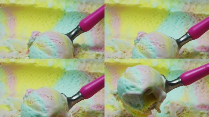 用勺子舀的特写彩虹冰淇淋。