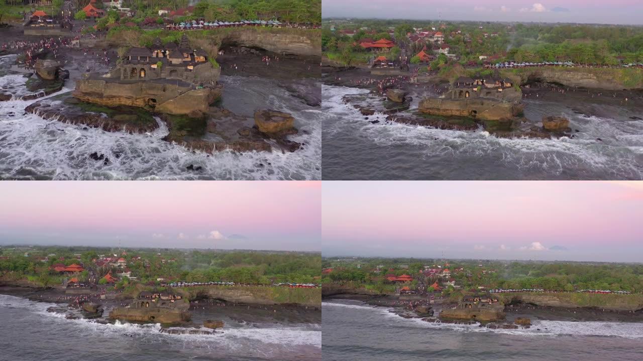 日落时间巴厘岛著名海湾拥挤旅游寺庙综合体航空全景4k印度尼西亚