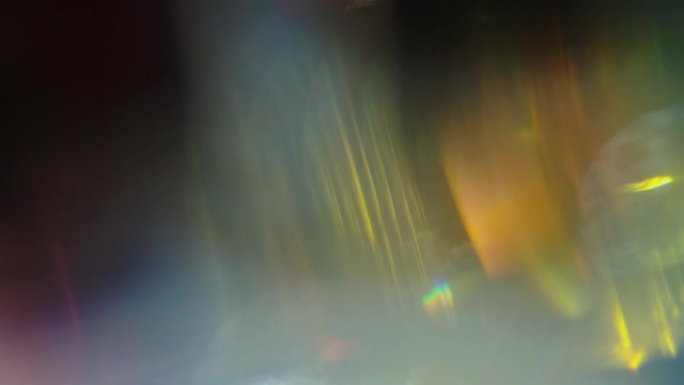 不同颜色的霓虹怀旧bokeh，漏光，时尚虹彩背景