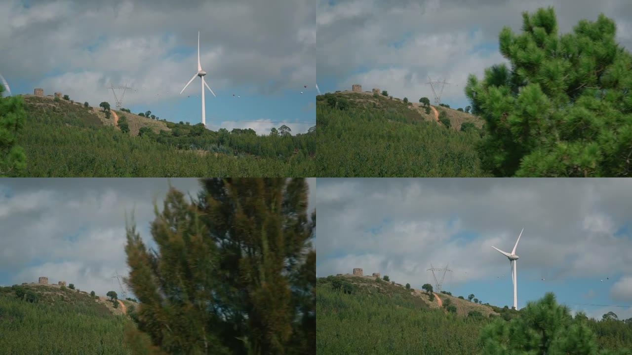 风力发电机，风车叶片在空气中旋转。绿色能源