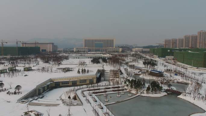 航拍荆门市民广场雪景