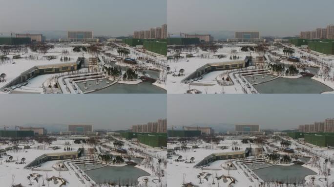 航拍荆门市民广场雪景