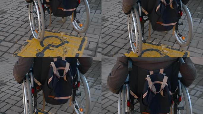 城市中的残疾人问题，街上坐轮椅的人