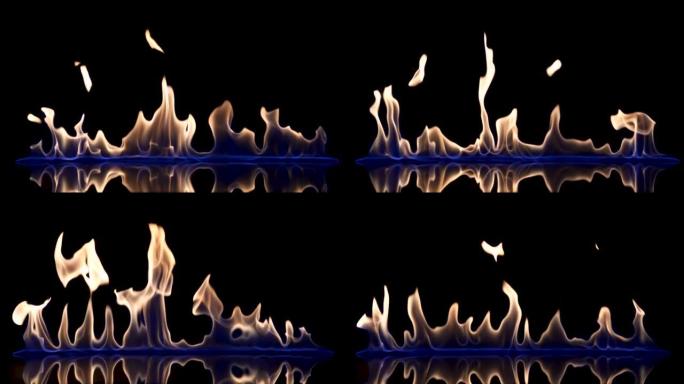 黑色反射背景下易燃液体或汽油的闪光和火焰条纹。一场大火，燃烧的舌头在蓝光中燃烧，以慢动作关闭。火焰